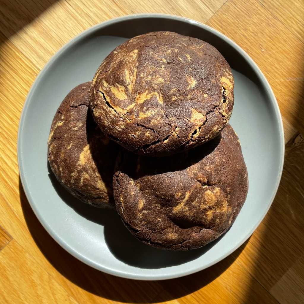 A dense deeply chocolatey cookie packed with ribbons of mildly sweet peanut butter fudge, or whatever variety of nutty inclusions you prefer.