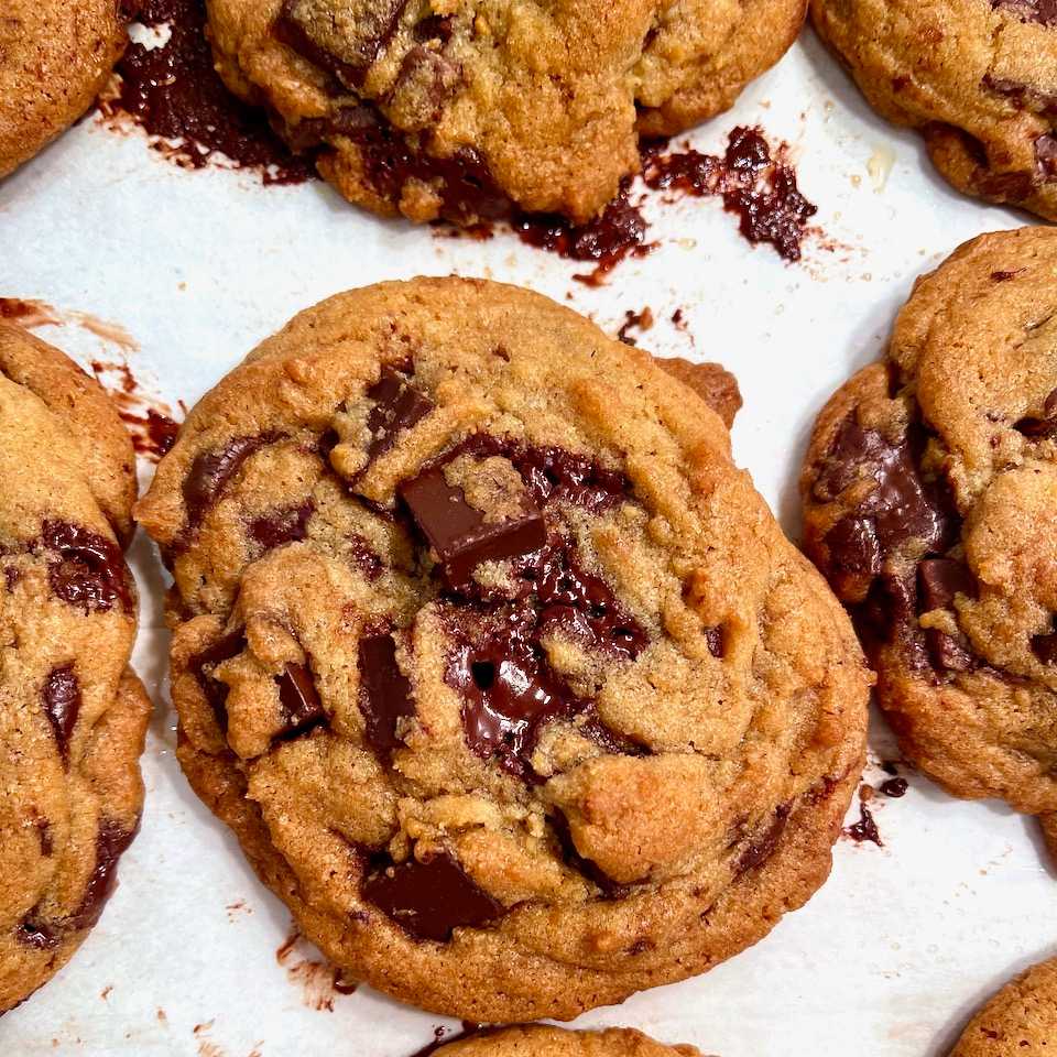 I feel like every baker has to go on a Chocolate Chip Cookie journey at some point. The CCC is a sweet with variables, with levers. Some things have a right, way to be. Macarons have a rubric. Croissants have a rubric. Tarts, pies, florentines, pita, baguettes, they all have an ideal outcome. Chocolate Chip Cookies can be chewy, crispy, doughy, gooey, rich, salty, quick, laborious, toasty, small, or nearly half a pound. All Chocolate Chip Cookies are valid, and loved.