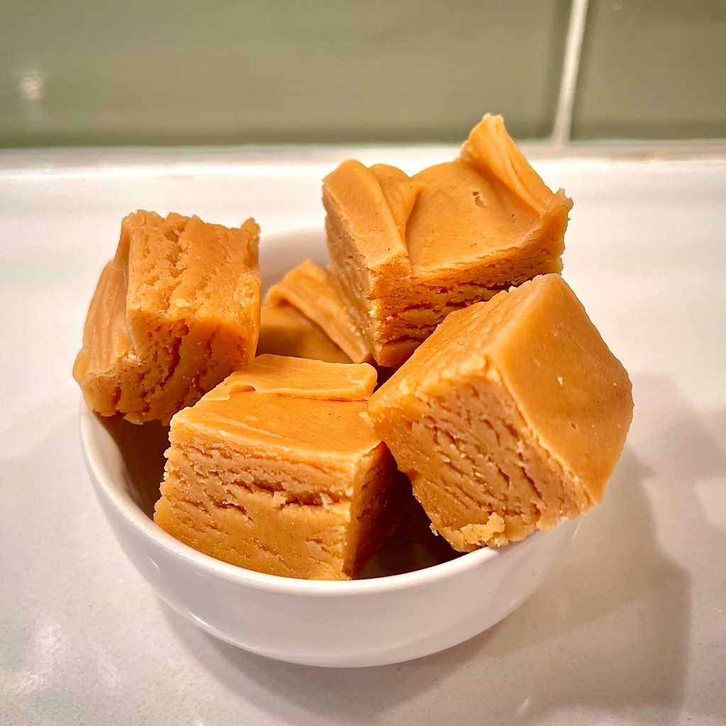 No need to refrigerate, no texture-wrecking shortcuts like sweetened condensed milk — which results in disappointing fudge that won’t hold its shape at room temperature — and a result that outshines anything you can do with a microwave and powdered sugar. Quality peanut butter fudge isn’t easy to make, but I promise you can handle it. I’ve adopted some of the shortcuts that don’t compromise on flavor or texture, so this recipe isn’t exactly how your great grandma made it, but the result is indistinguishable. At least it is indistinguishable from how my own late grandmother made it.
