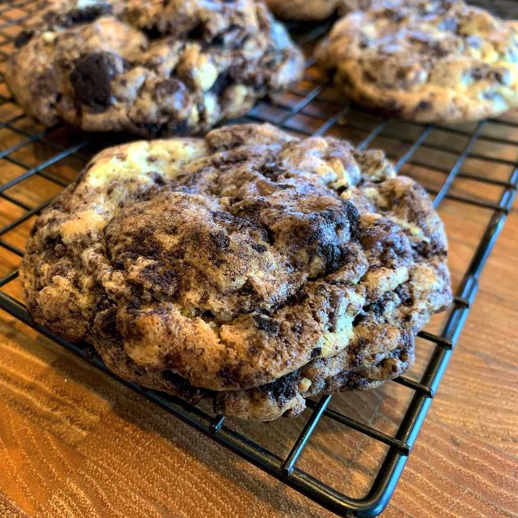 A cookie inspired by an Ice Cream flavor inspired by a cookie. These are less toasty and caramelized than a chocolate-chip cookie, leaving space for the "cream" and the cocoa to shine.